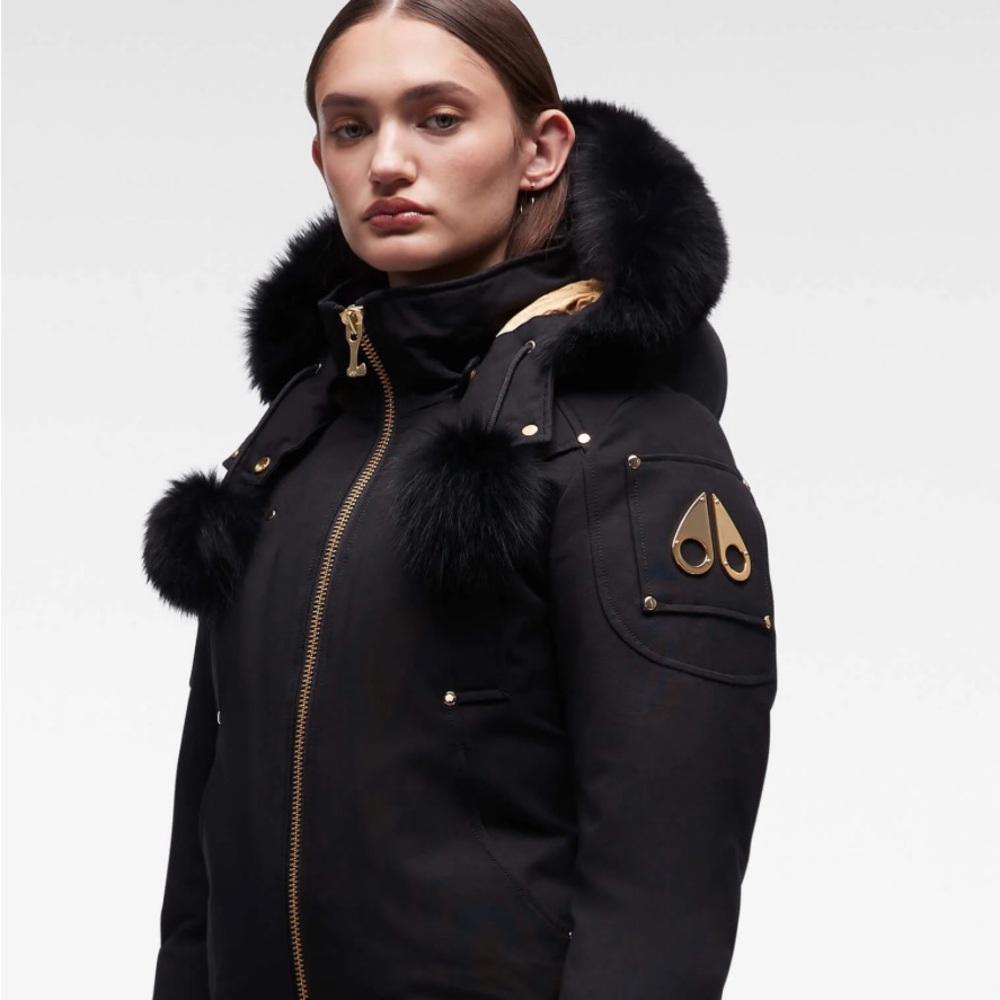 Moose Knuckles 
GOLD DEBBIE BOMBER